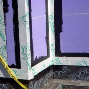 ExoAir 110 applied at window transition with black membrane