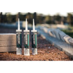 Vulkem Grip adhesive sealant tubes on a construction site for versatile bonding