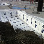 Below-grade EPS insulation installed on commercial foundation wall for thermal protection