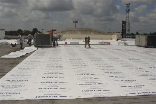 EPS roof insulation boards installed on large commercial flat roof during construction phase