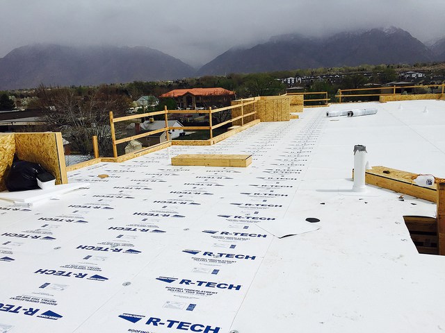 R-Tech EPS insulation boards installed on a commercial flat roof for energy efficiency and waterproofing support