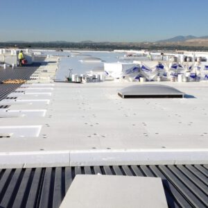 Commercial roof insulation installed with Insulfoam EPS panels on flat roofing system